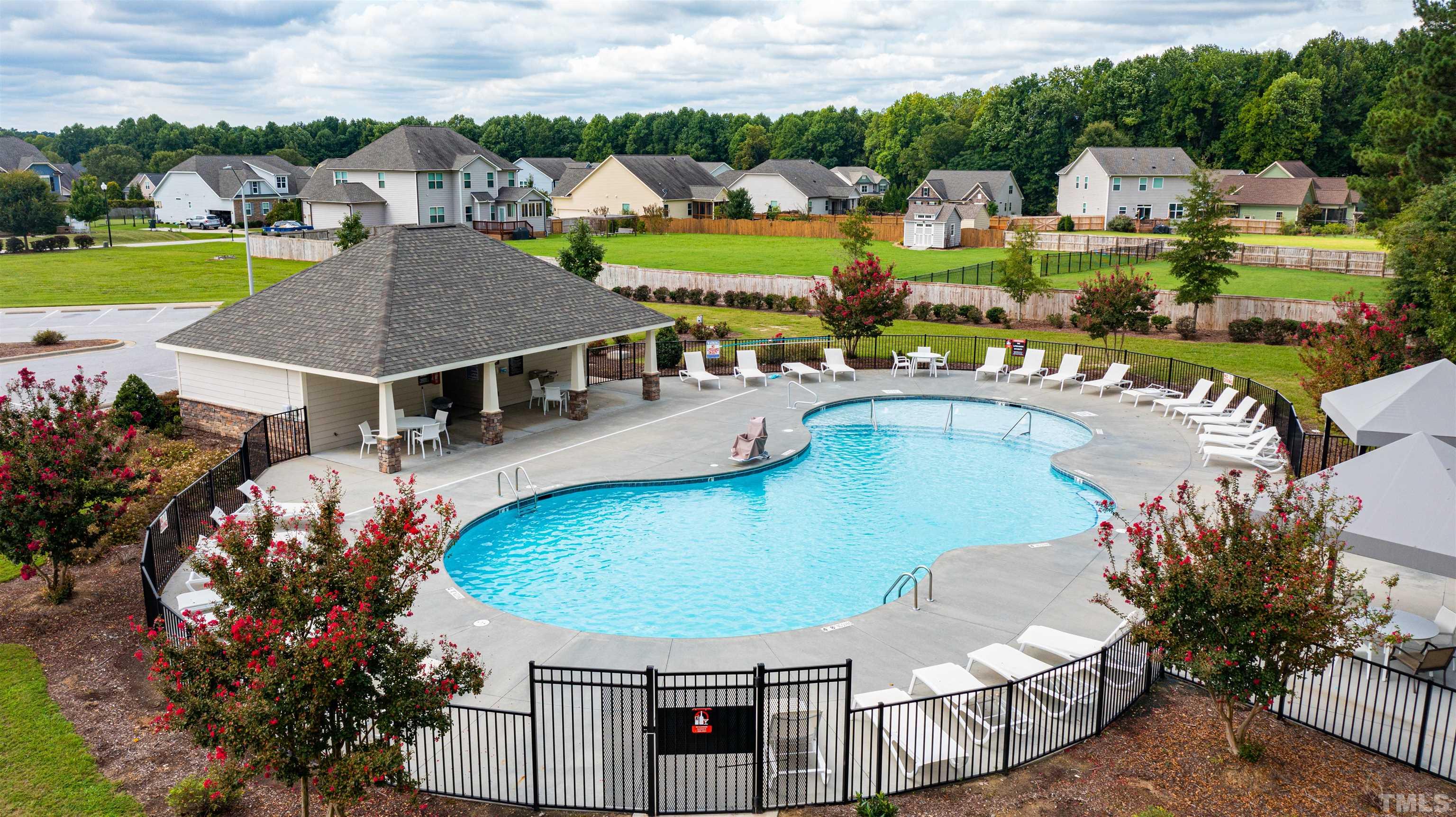 8340 Yellow Aster Court Willow Spring, NC 27592 - Photo 34 of 35 an aerial view of a house with swimming pool garden and patio
