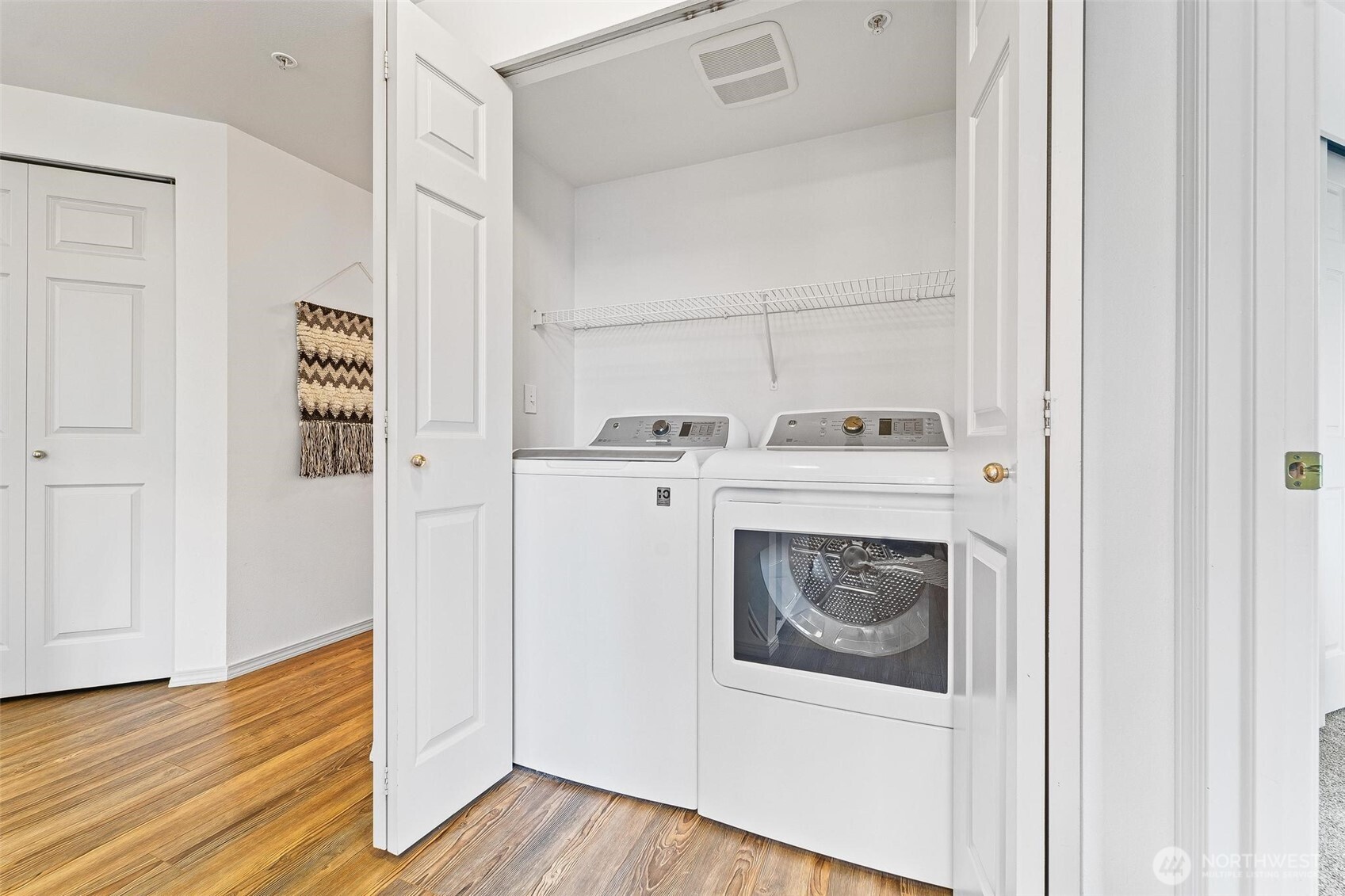 15020 Bothell Way Northeast, Unit 502 Lake Forest Park, WA 98155 - Photo 11 of 30 a utility room with washer and dryer