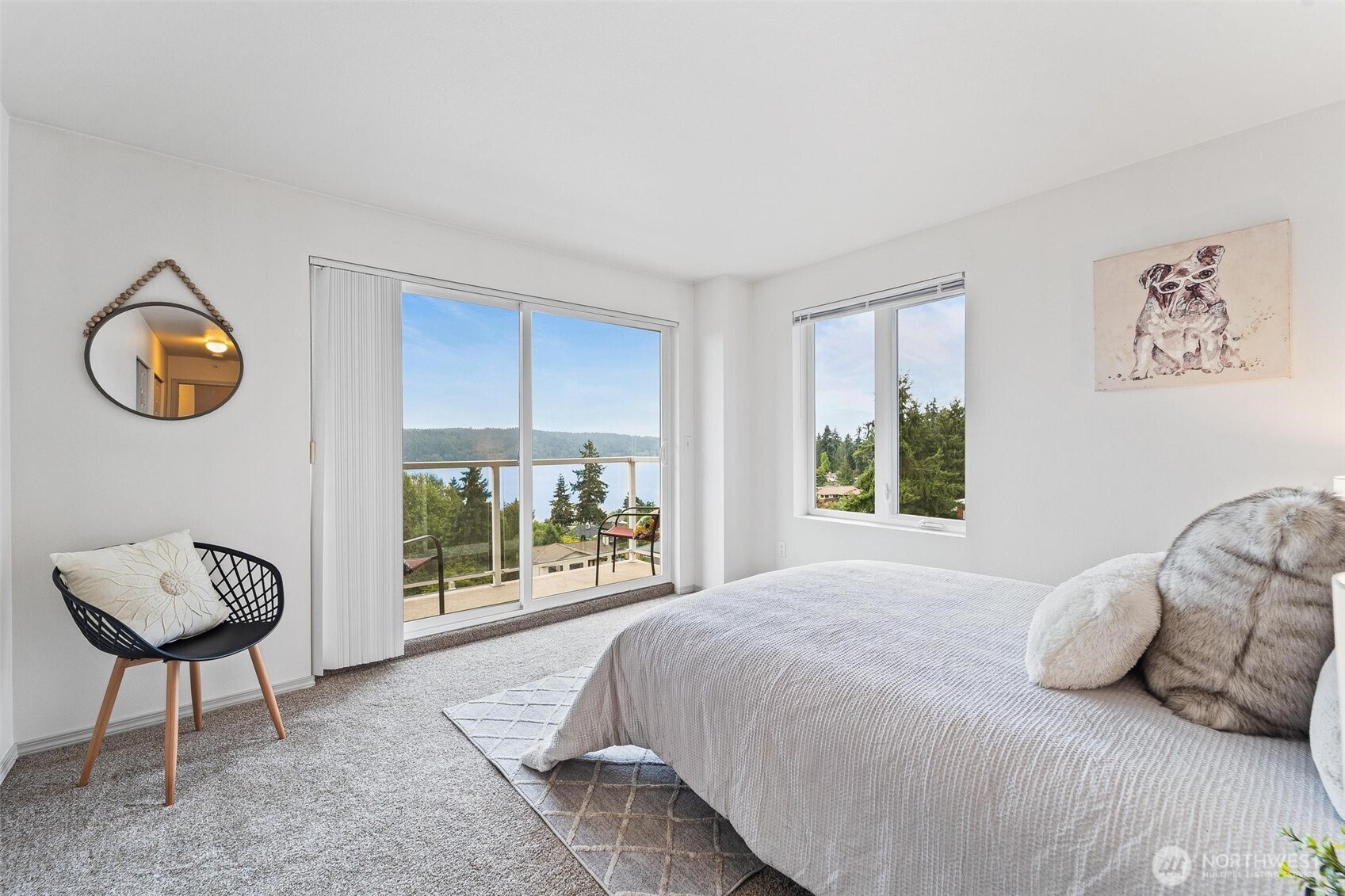 15020 Bothell Way Northeast, Unit 502 Lake Forest Park, WA 98155 - Photo 13 of 30 a bedroom with a bed and a chair