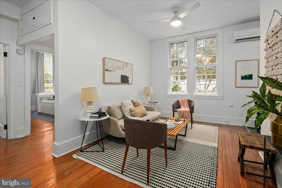 Hardwood floors and lots of windows throughout.