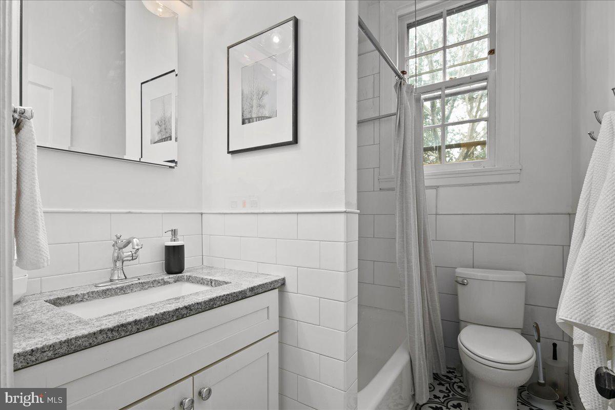 3039 Macomb Street Northwest, Unit 18 Washington, DC 20008 - Photo 19 of 26 Beautifully renovated bathroom.