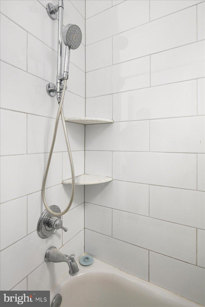 3039 Macomb Street Northwest, Unit 18 Washington, DC 20008 - Photo 21 of 26 Beautifully renovated bathroom.