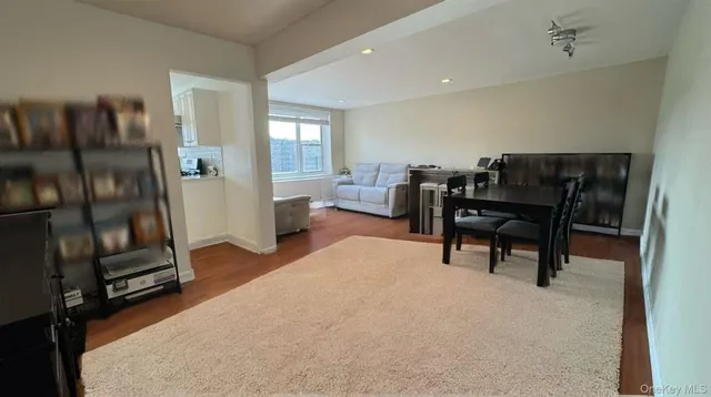 a workspace with furniture and a window