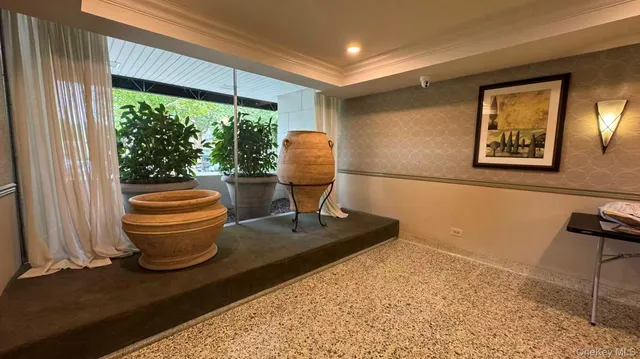 a living room with a couch and a table