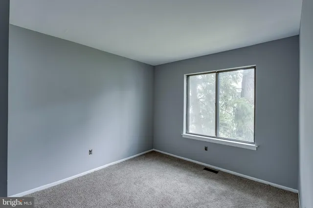 a bathroom with a sink a mirror and vanity