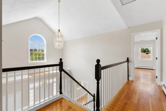 a view of hallway with stairs