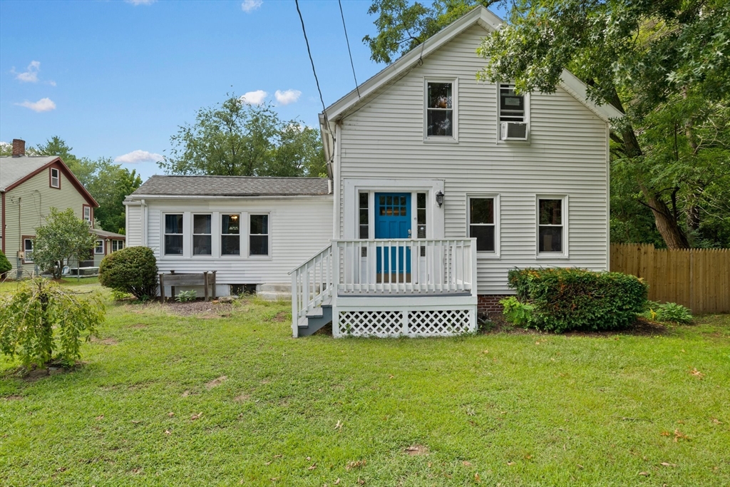 642 Cooley Street Springfield, MA 01118 - Photo 36 of 36 a front view of a house with a yard