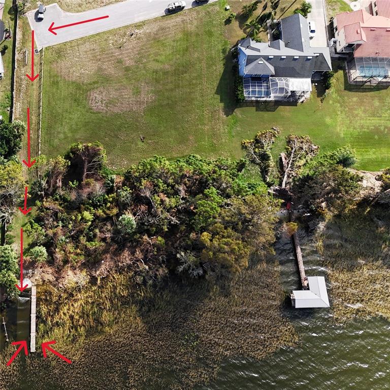 817 Oaks Shores Road Leesburg, FL 34748 - Photo 7 of 10 a view of a lake