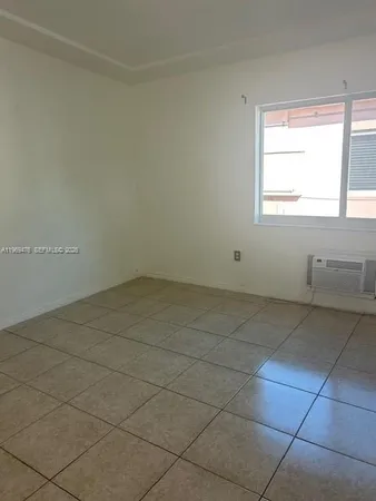 a view of a room with a window