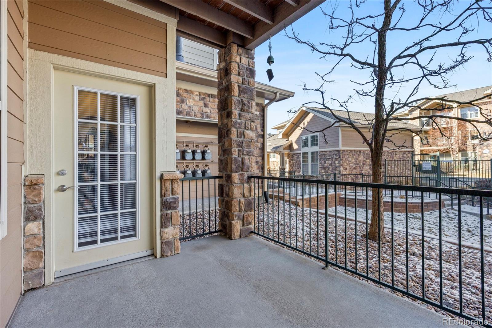 10805 Twenty Mile Road, Unit 104 Parker, CO 80134 - Photo 26 of 43 a view of a house with a large window