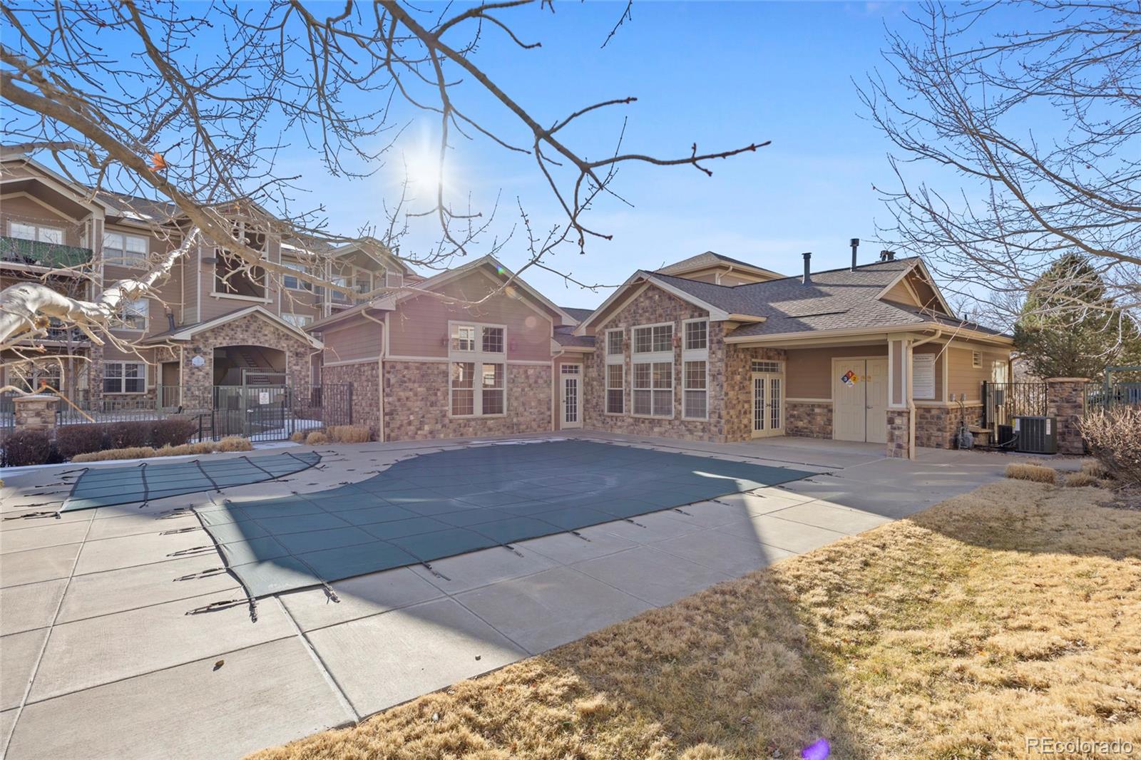 10805 Twenty Mile Road, Unit 104 Parker, CO 80134 - Photo 40 of 43 a view of a large white building