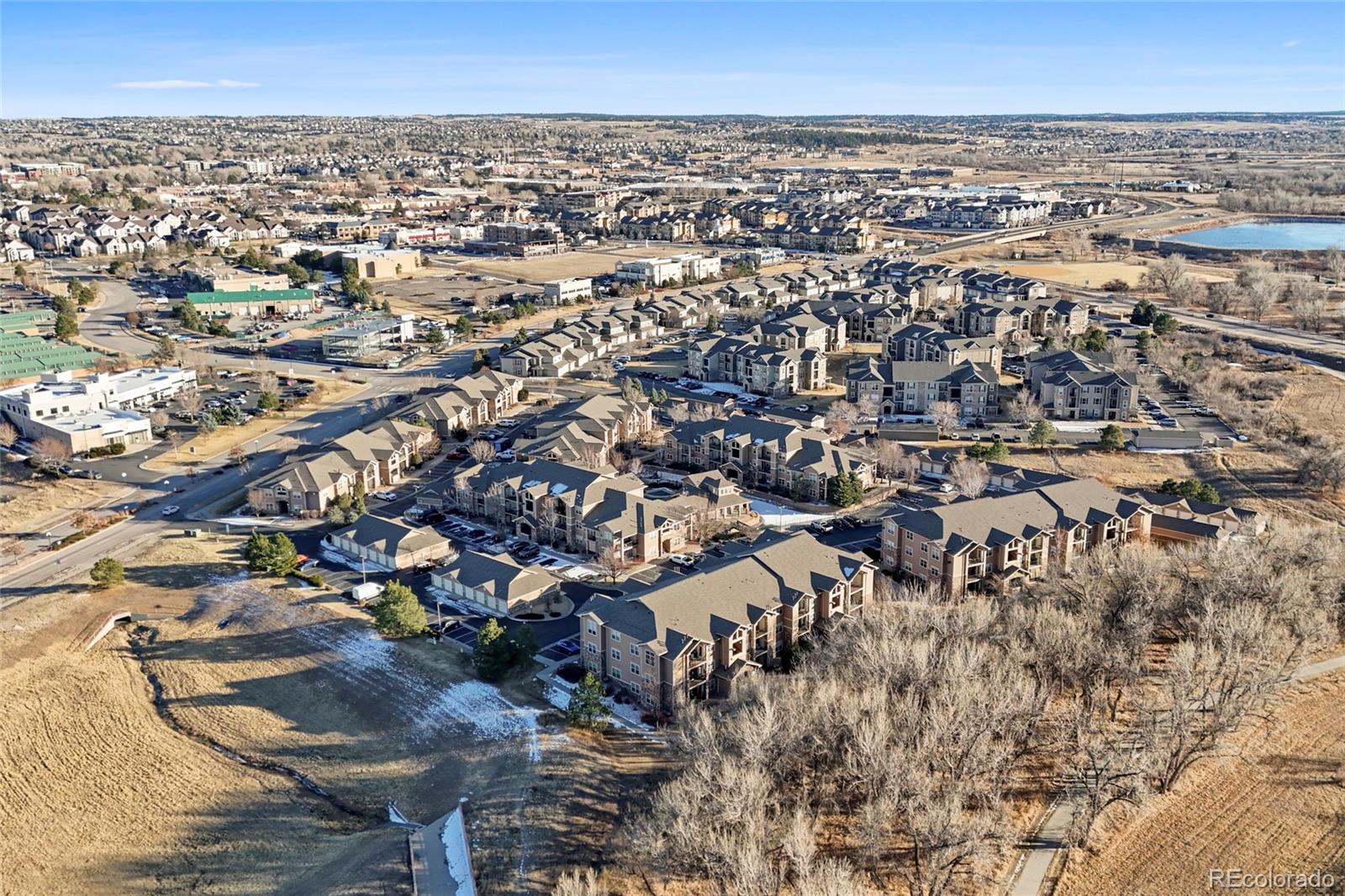 10805 Twenty Mile Road, Unit 104 Parker, CO 80134 - Photo 42 of 43 an aerial view of a city