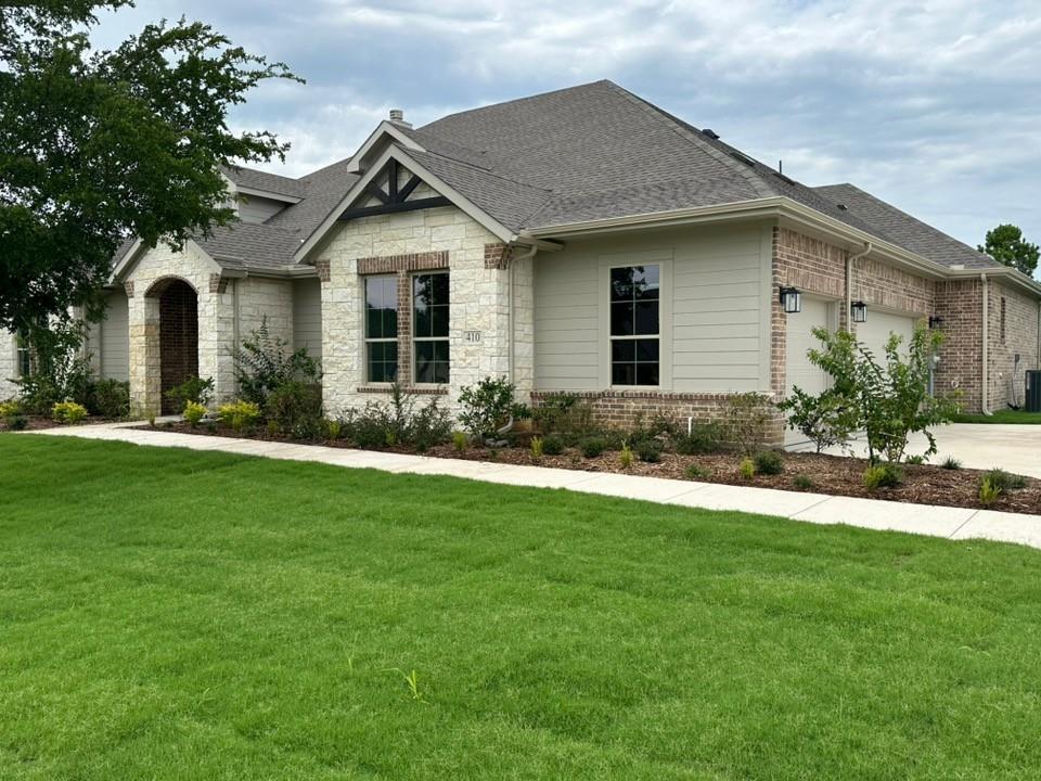 410 Cobb Road Leonard, TX 75452 - Photo 3 of 24 Stone and brick exterior with light-colored siding accents
