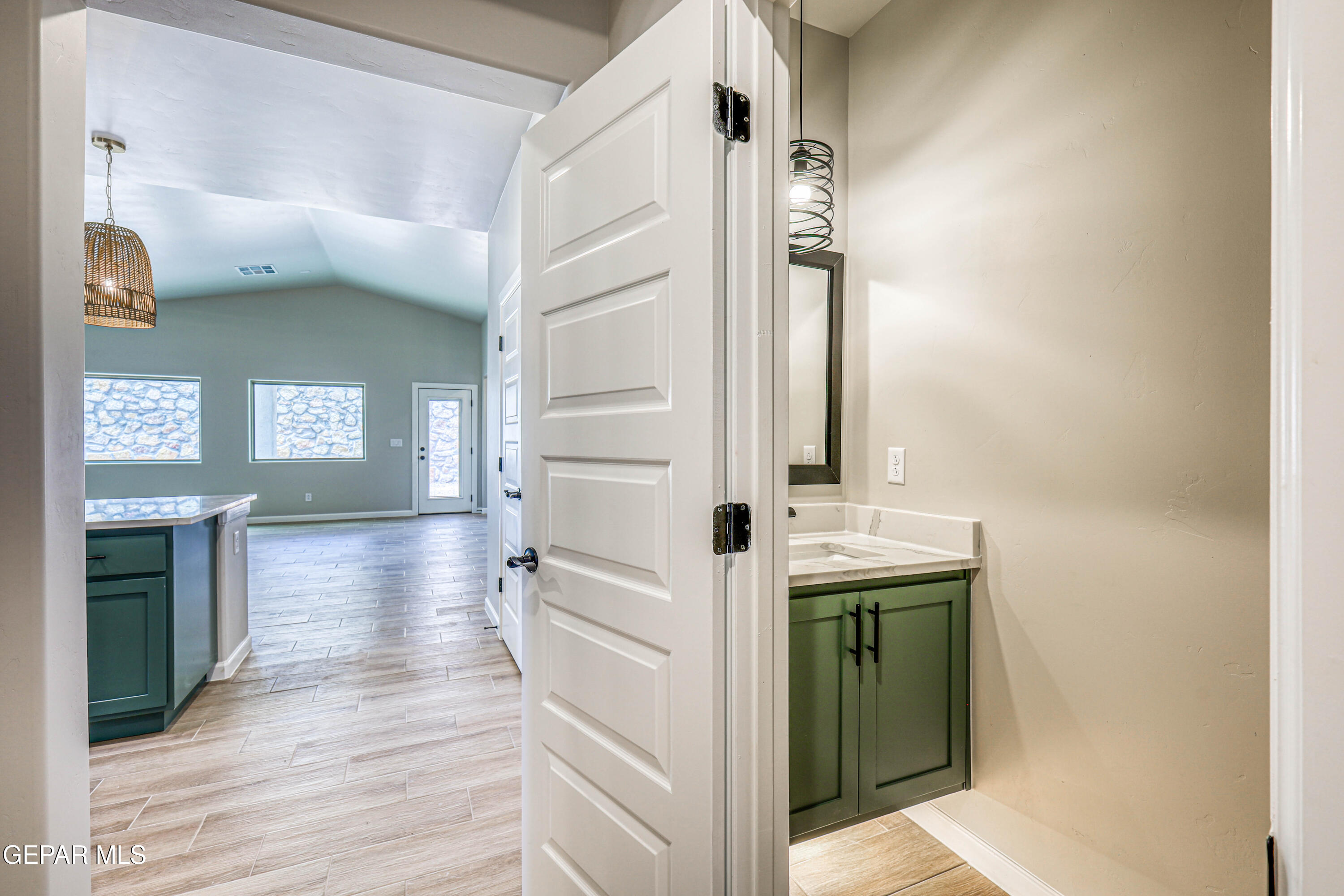 6047 Zinc Hill Street Sunland Park, NM 88008 - Photo 10 of 18 a view of a hallway with wooden floor and staircase