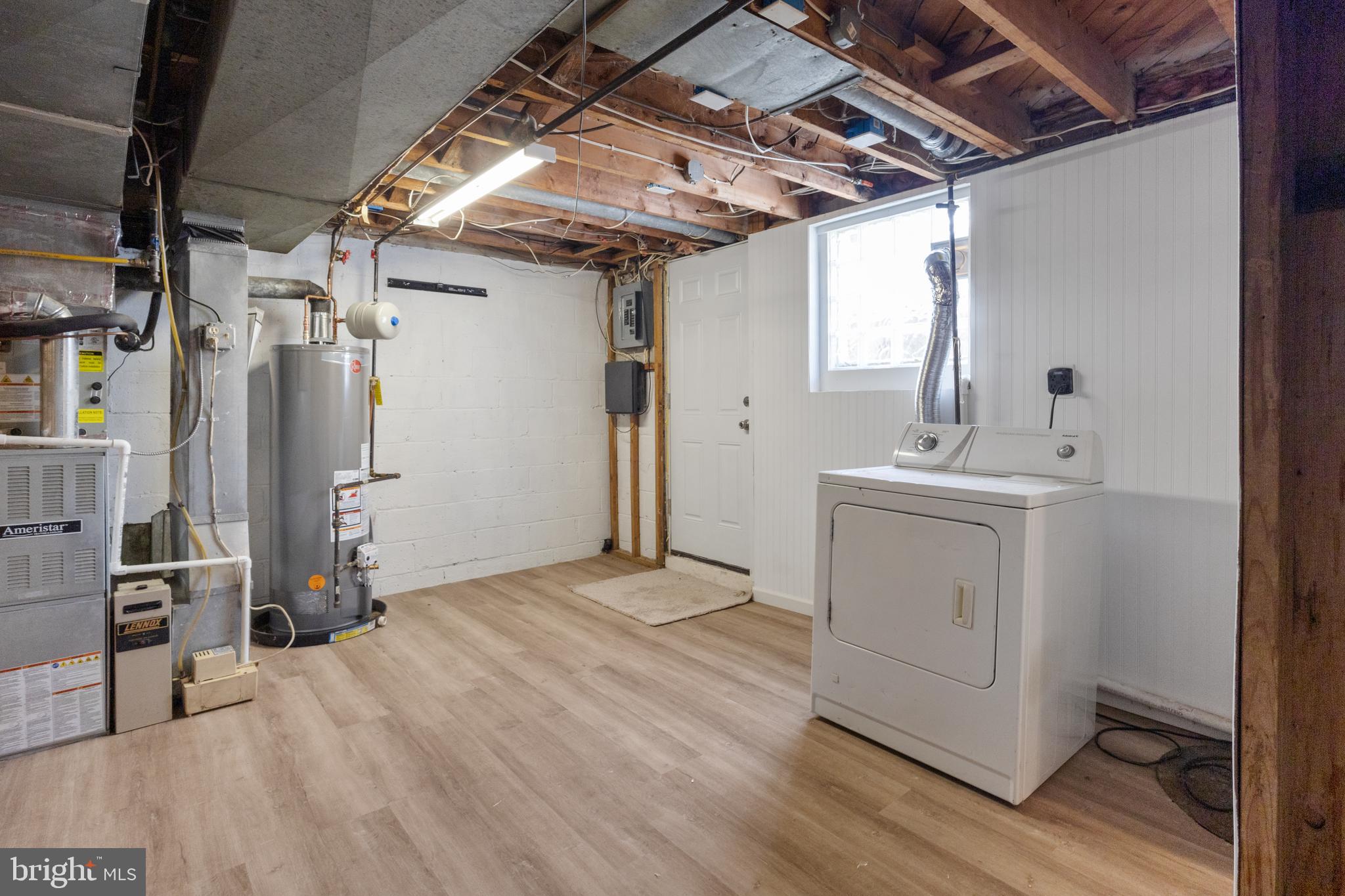 2020 Holborn Road Dundalk, MD 21222 - Photo 21 of 24 Laundry/storage area with brand new flooring.