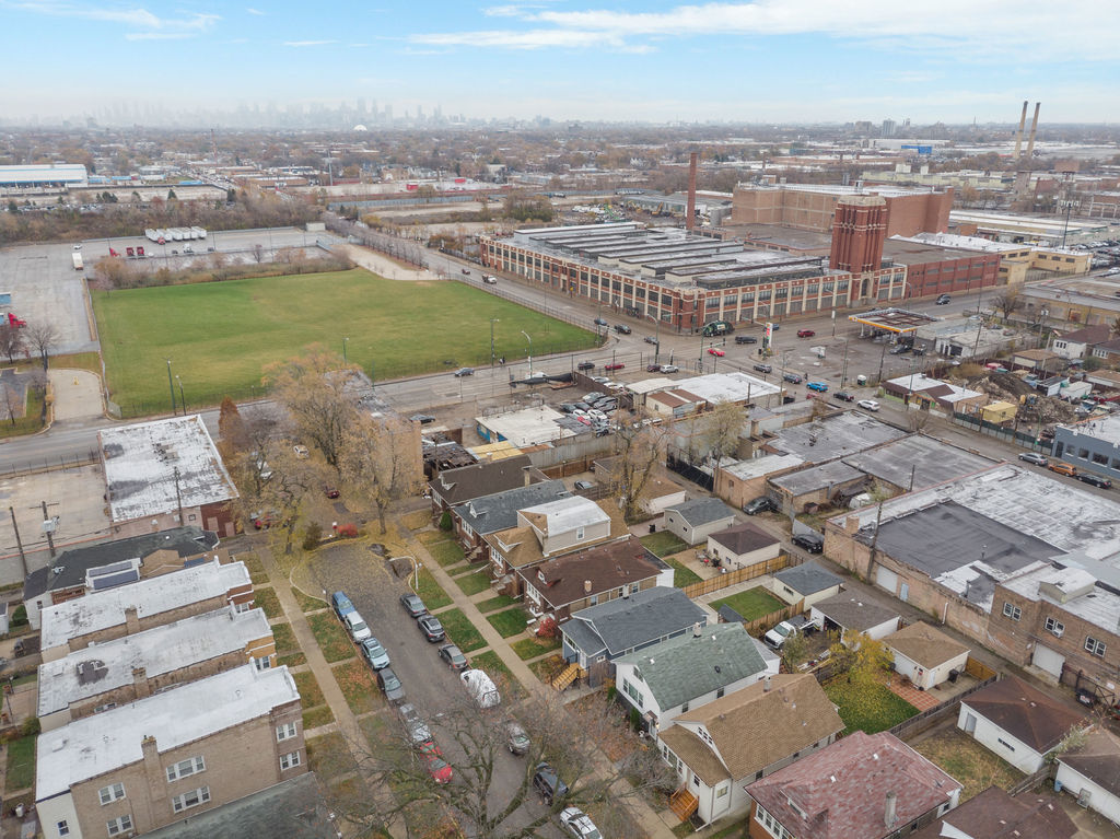 4827 West Crystal Street Chicago, IL 60651 - Photo 6 of 6 an aerial view of a city with lots of residential buildings