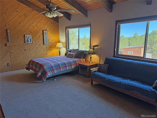 a view of an entryway with a small yard