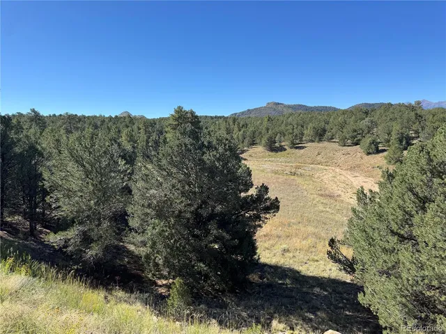 a view of lake with green space