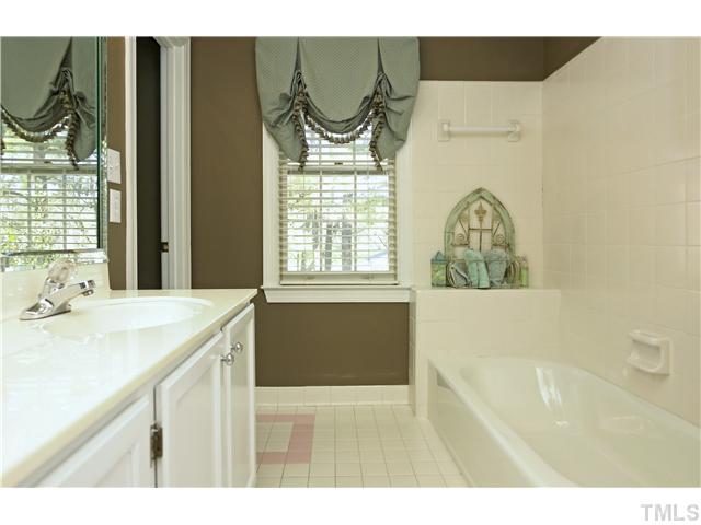 115 Skylark Way Raleigh, NC 27615 - Photo 11 of 17 a bathroom with a sink and a bathtub