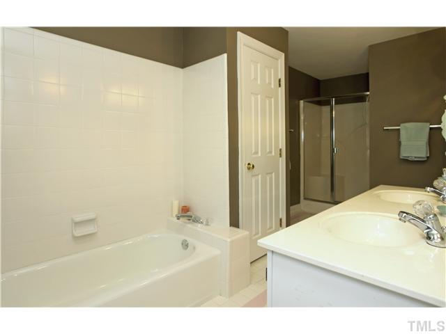 115 Skylark Way Raleigh, NC 27615 - Photo 12 of 17 a bathroom with a sink and a bathtub