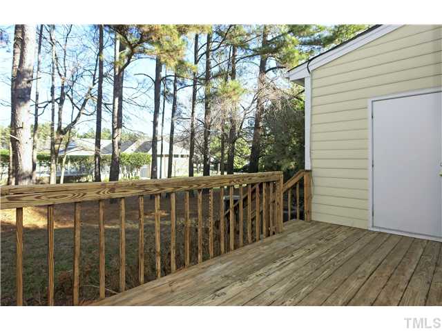 115 Skylark Way Raleigh, NC 27615 - Photo 15 of 17 a view of a wooden deck