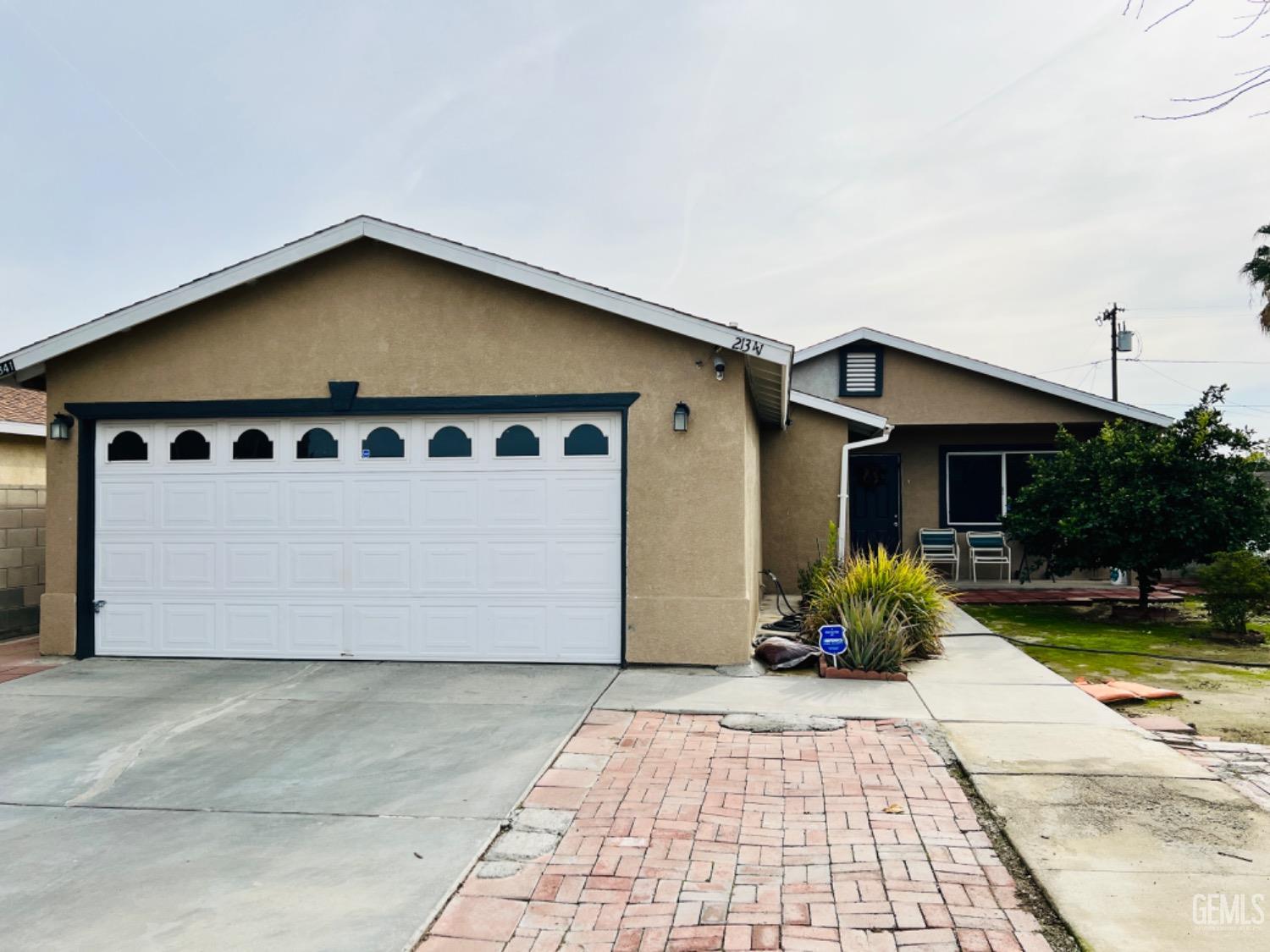 Undisclosed Address Lost Hills, CA 93249 - Photo 1 of 10 a view of a house with a yard