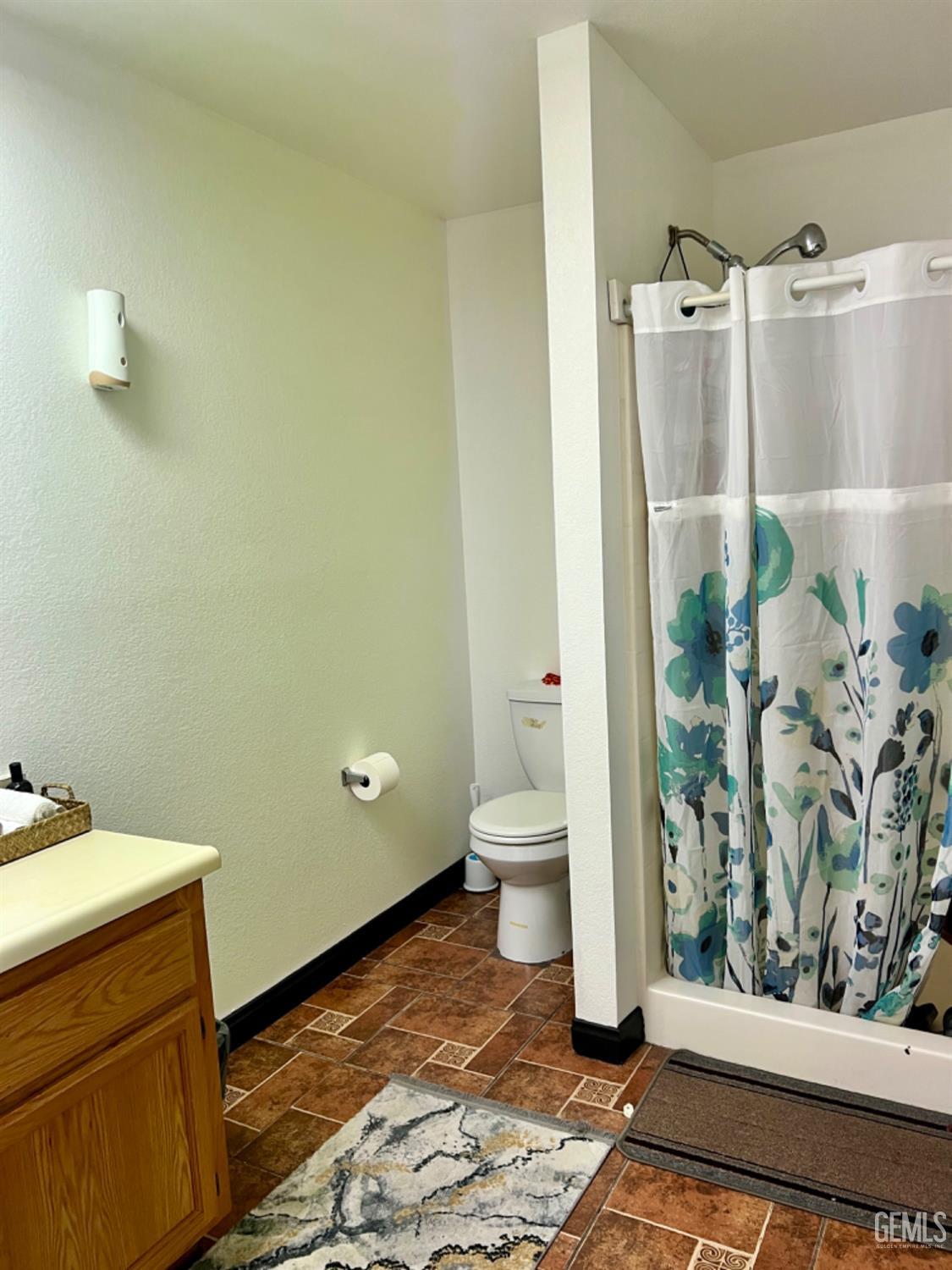 Undisclosed Address Lost Hills, CA 93249 - Photo 7 of 10 a bathroom with a sink and toilet
