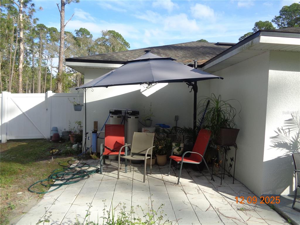 2380 8th Avenue DeLand, FL 32724 - Photo 12 of 31 a view of outdoor space yard deck patio and fire pit