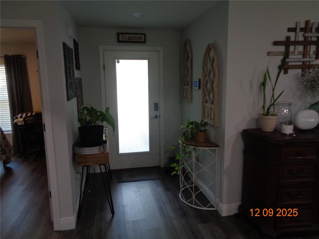 2380 8th Avenue DeLand, FL 32724 - Photo 13 of 31 a workspace with furniture and a potted plant