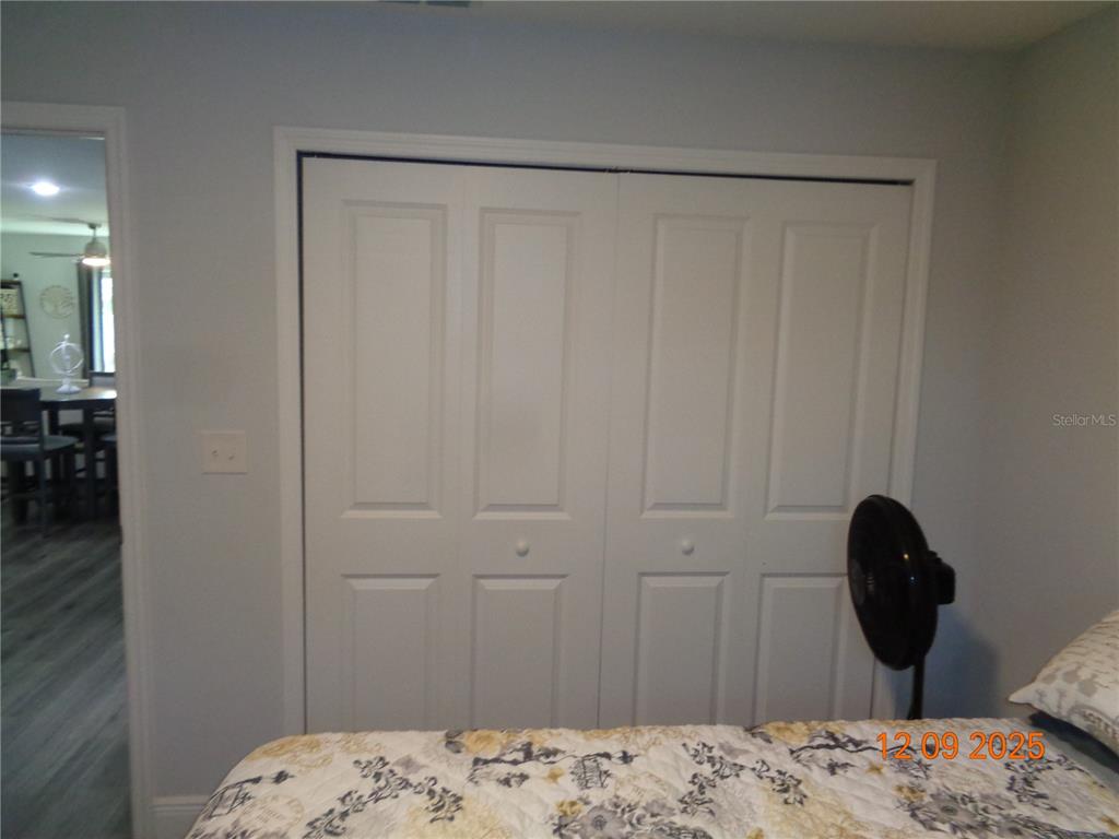 2380 8th Avenue DeLand, FL 32724 - Photo 15 of 31 a bedroom with a bed and a dresser