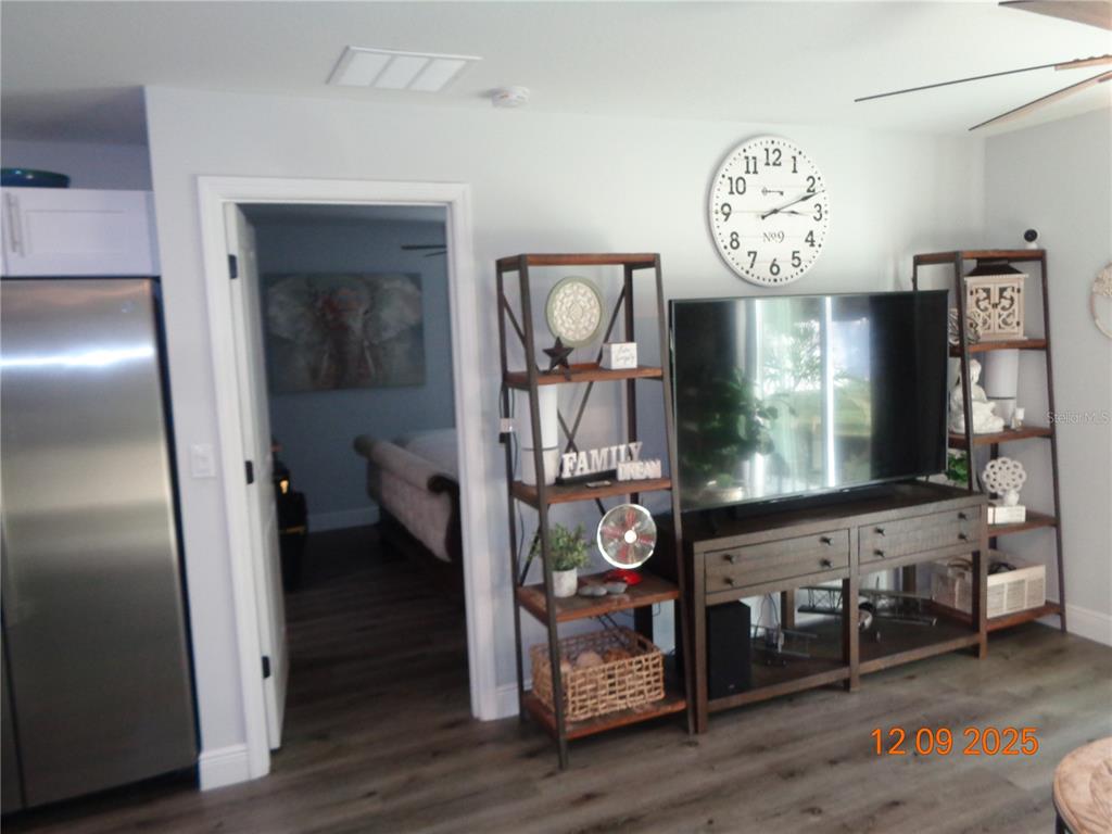 2380 8th Avenue DeLand, FL 32724 - Photo 26 of 31 a view of a livingroom with furniture and a flat screen tv