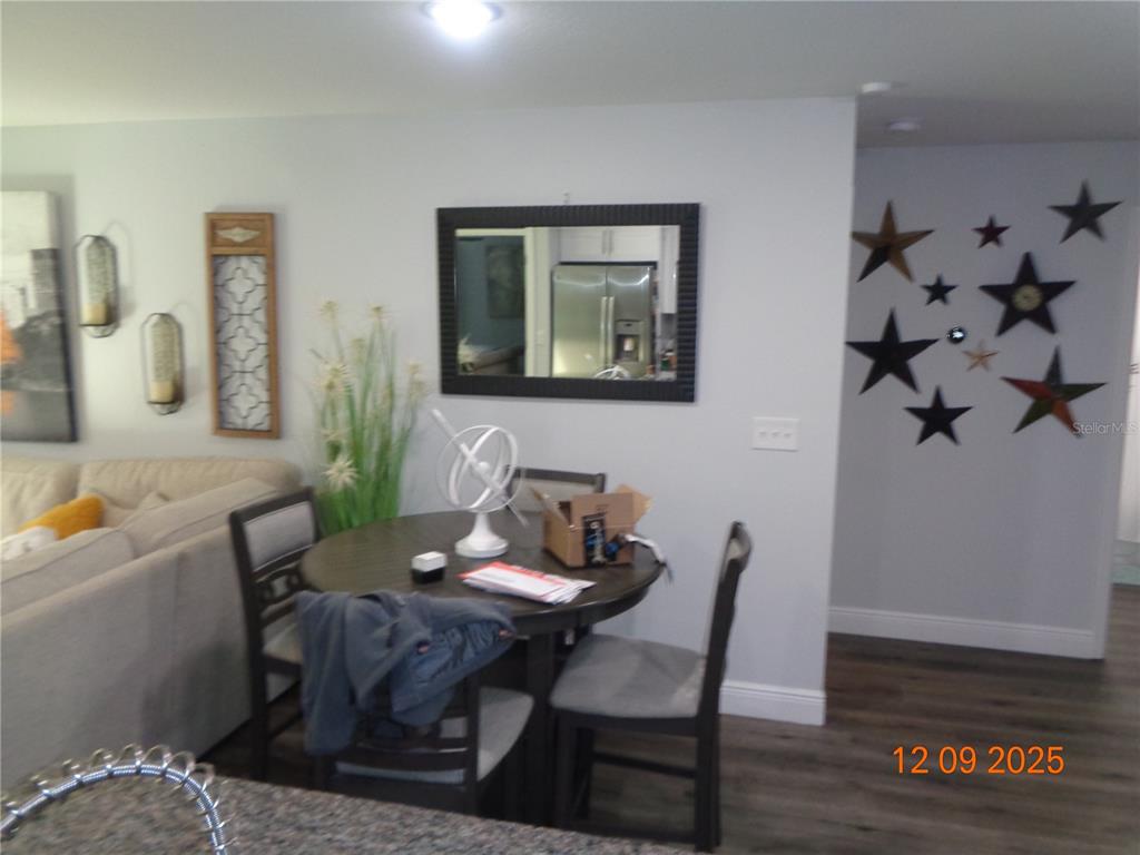 2380 8th Avenue DeLand, FL 32724 - Photo 31 of 31 a workspace with furniture and wooden floor