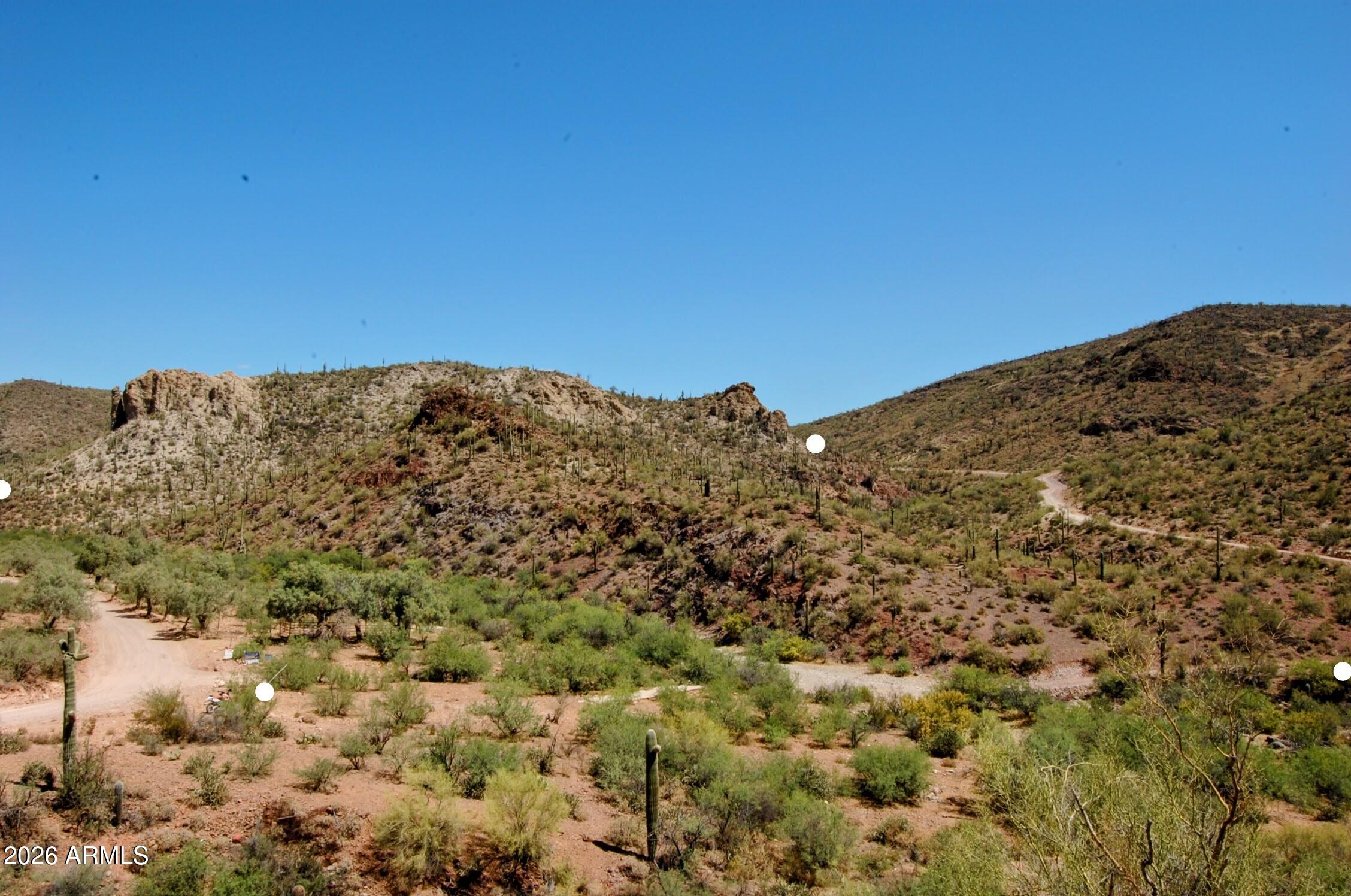 37700 Cow Creek Road, Unit 54 Morristown, AZ 85342 - Photo 1 of 42 a view of a large building