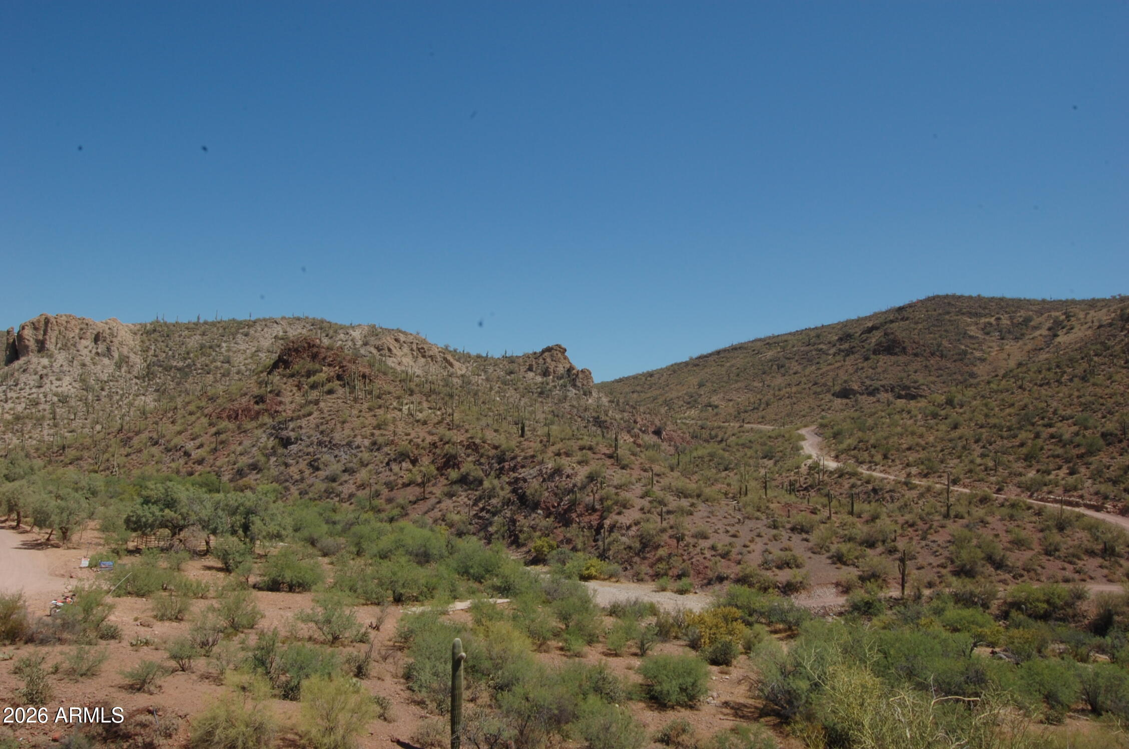 37700 Cow Creek Road, Unit 54 Morristown, AZ 85342 - Photo 21 of 42 a view of a dry yard