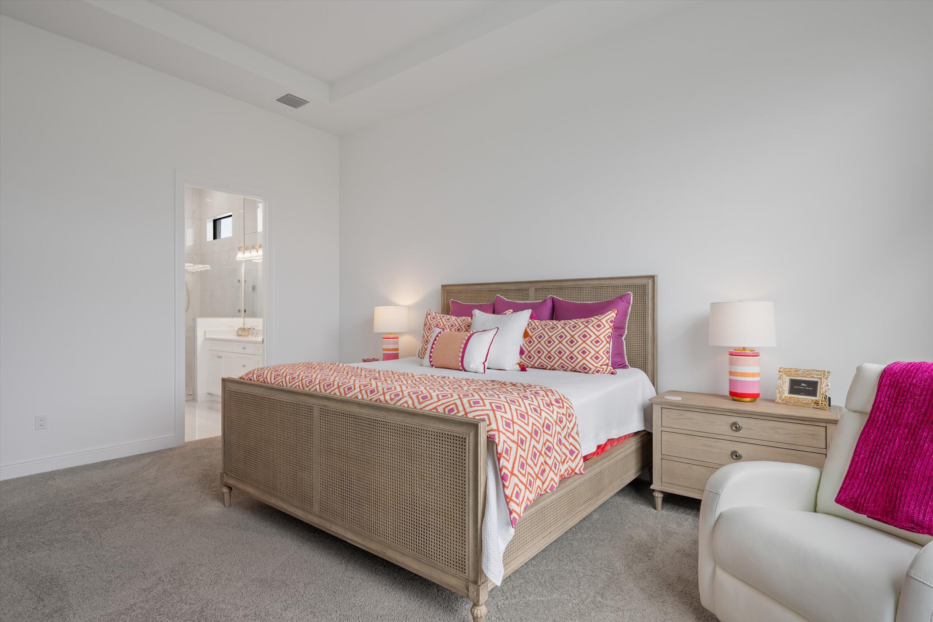 4891 Rivo Alto Circle Loxahatchee, FL 33470 - Photo 21 of 64 a bedroom with a bed and a chair