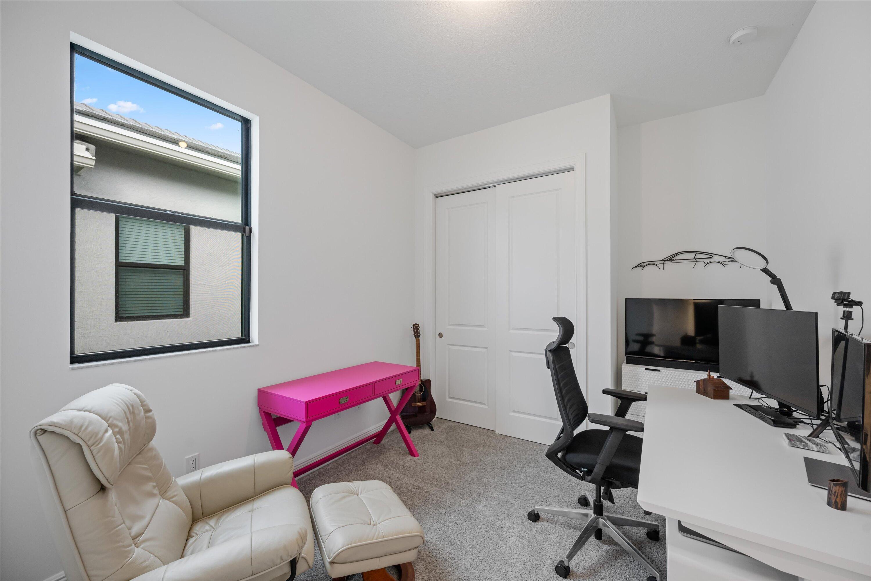 4891 Rivo Alto Circle Loxahatchee, FL 33470 - Photo 24 of 64 a view of a workspace with furniture and a workspace