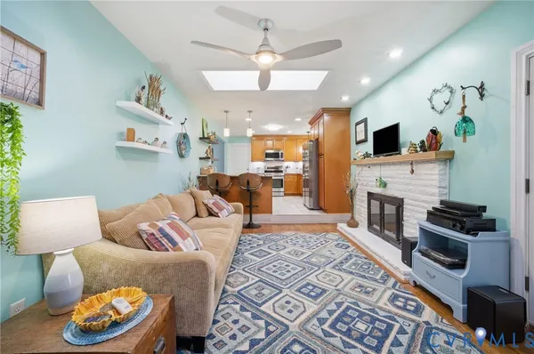 a living room with furniture and a rug