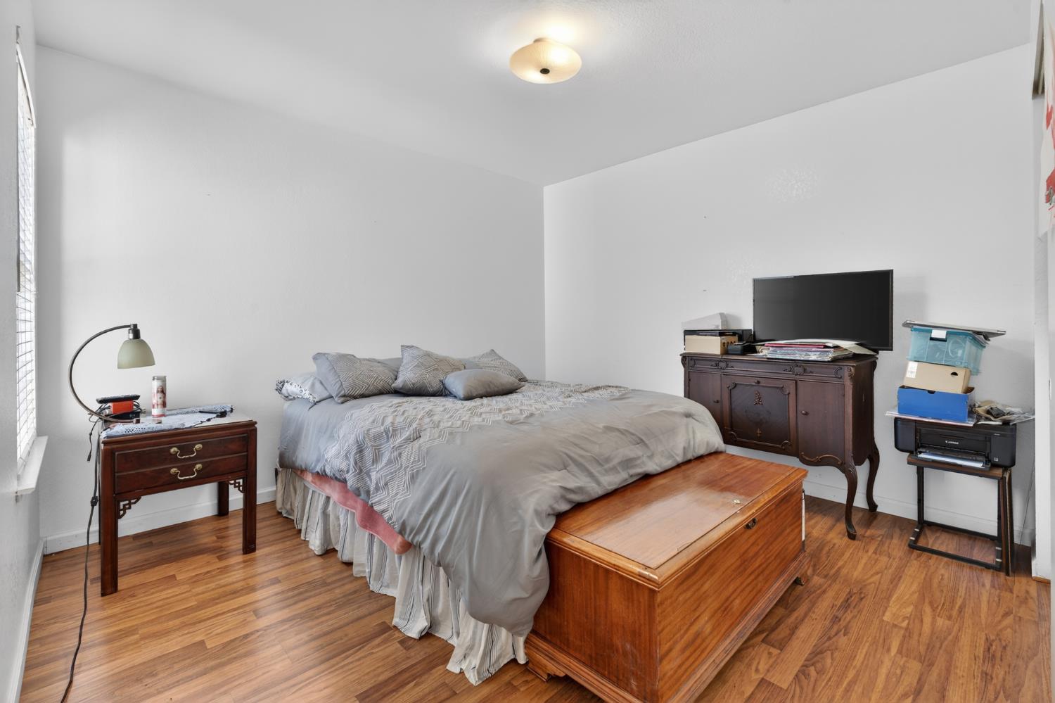 3072 Radford Way Turlock, CA 95382 - Photo 13 of 16 a bedroom with a bed and a flat screen tv