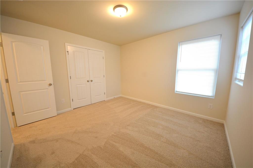 4305 Traipse Path Ellenwood, GA 30294 - Photo 36 of 36 a view of an empty room with a window