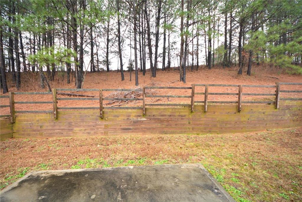 4305 Traipse Path Ellenwood, GA 30294 - Photo 5 of 36 a view of a swimming pool with a patio