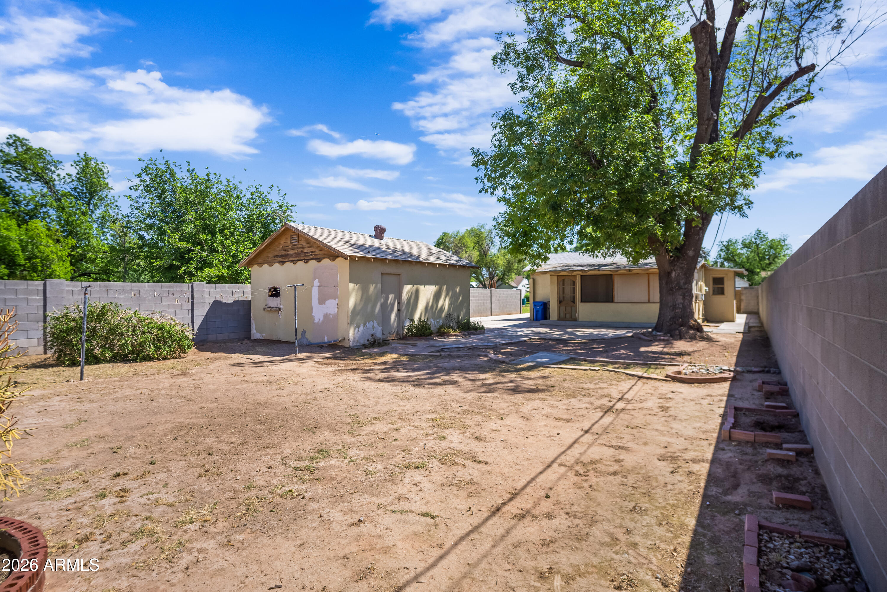 508 North Robson Mesa, AZ 85201 - Photo 15 of 19 a backyard of a house with table and chairs