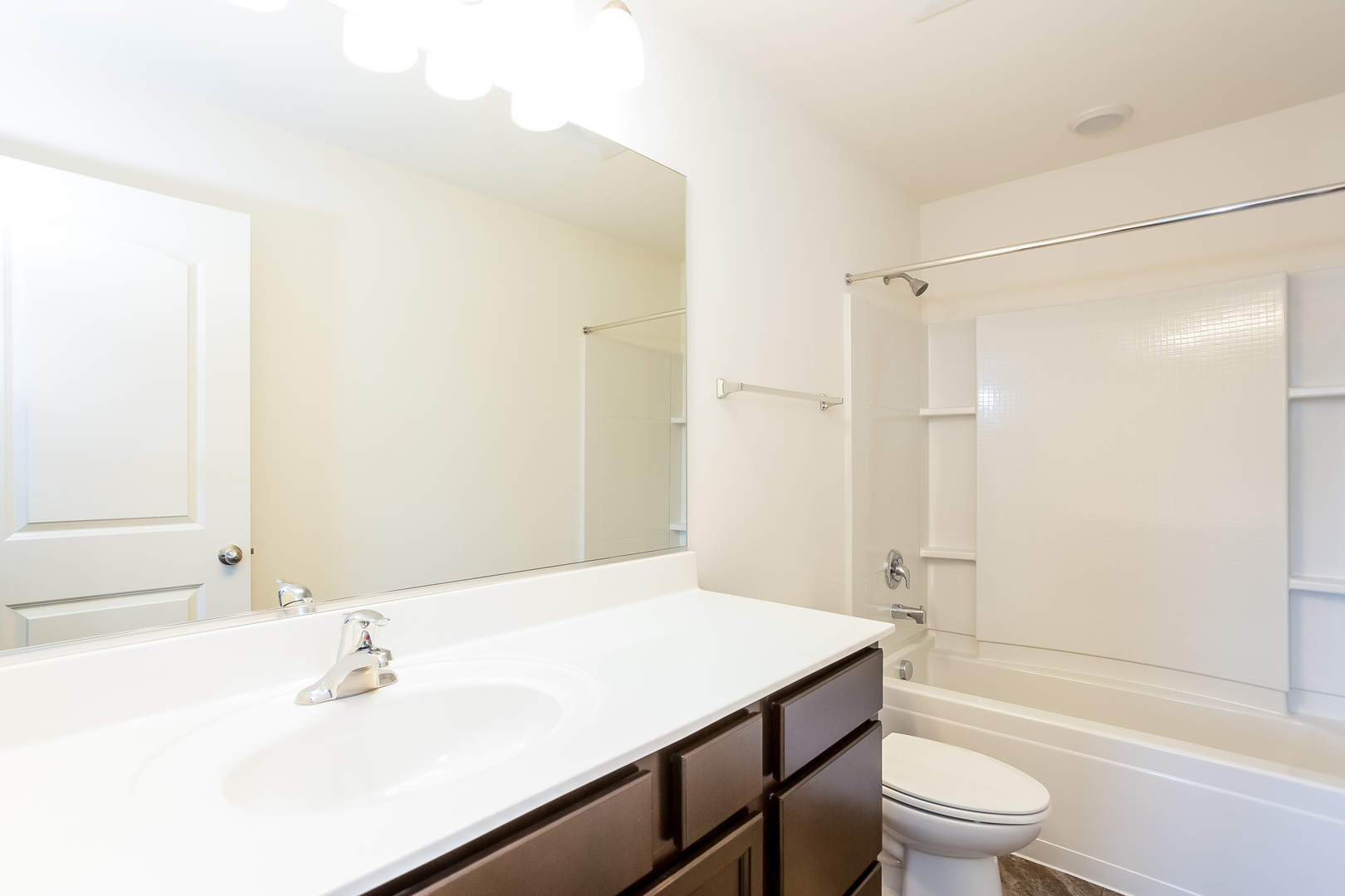 2407 Upland Road Pingree Grove, IL 60140 - Photo 9 of 19 a bathroom with a sink toilet and shower