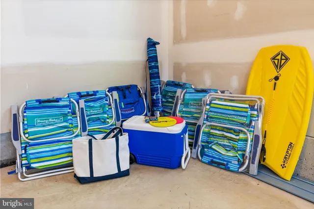 a living room with a bed and a couch