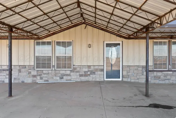 a kitchen with a sink stove and microwave