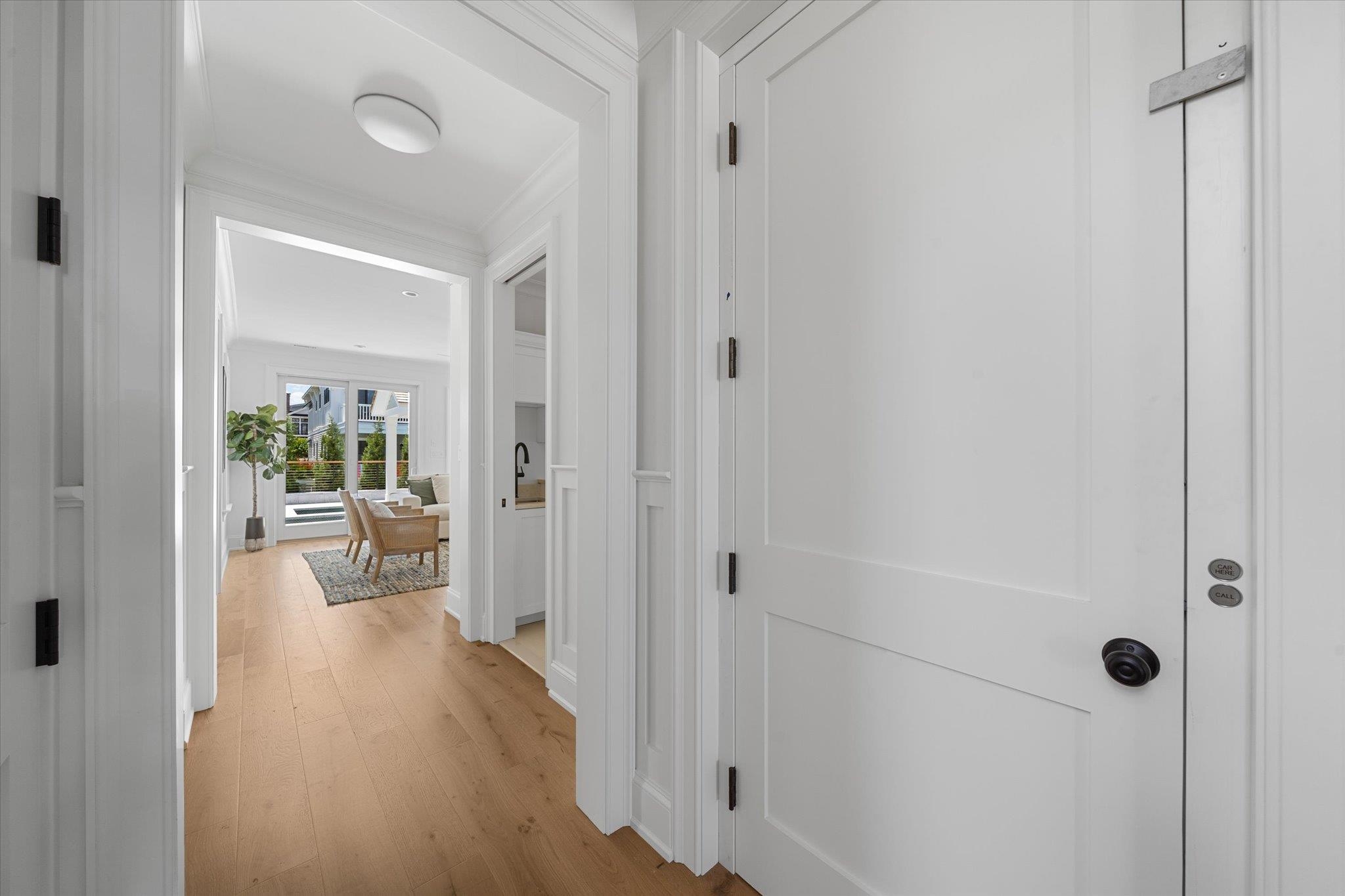 155 112th Stone Harbor, NJ 08247 - Photo 28 of 49 a view of a hallway with a wooden floor and a livingroom view