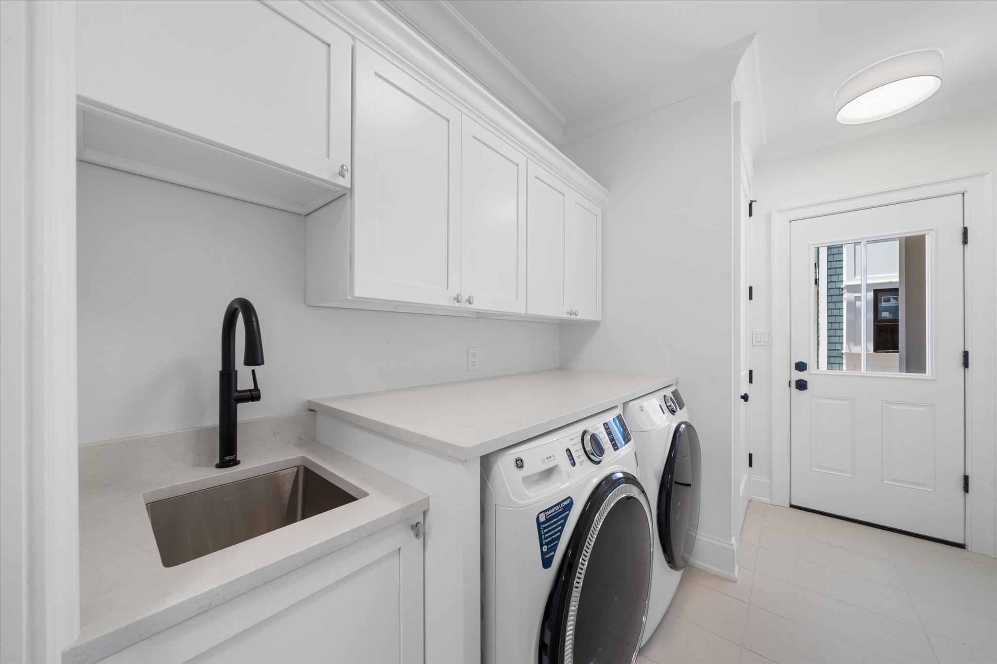155 112th Stone Harbor, NJ 08247 - Photo 29 of 49 a utility room with dryer and washer