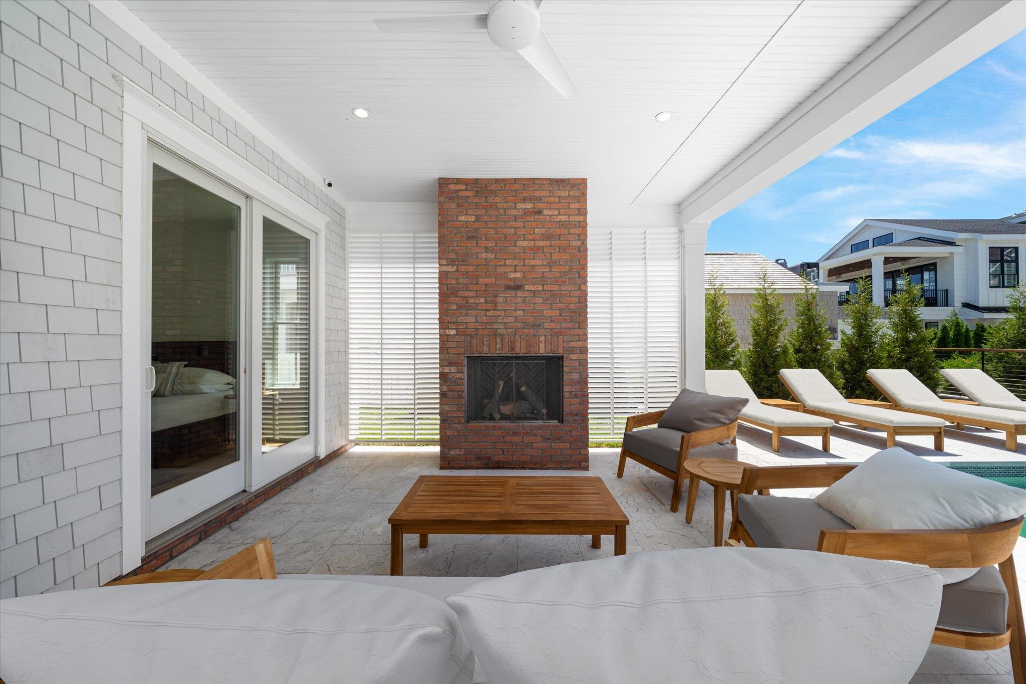155 112th Stone Harbor, NJ 08247 - Photo 43 of 49 a living room with furniture and a fireplace