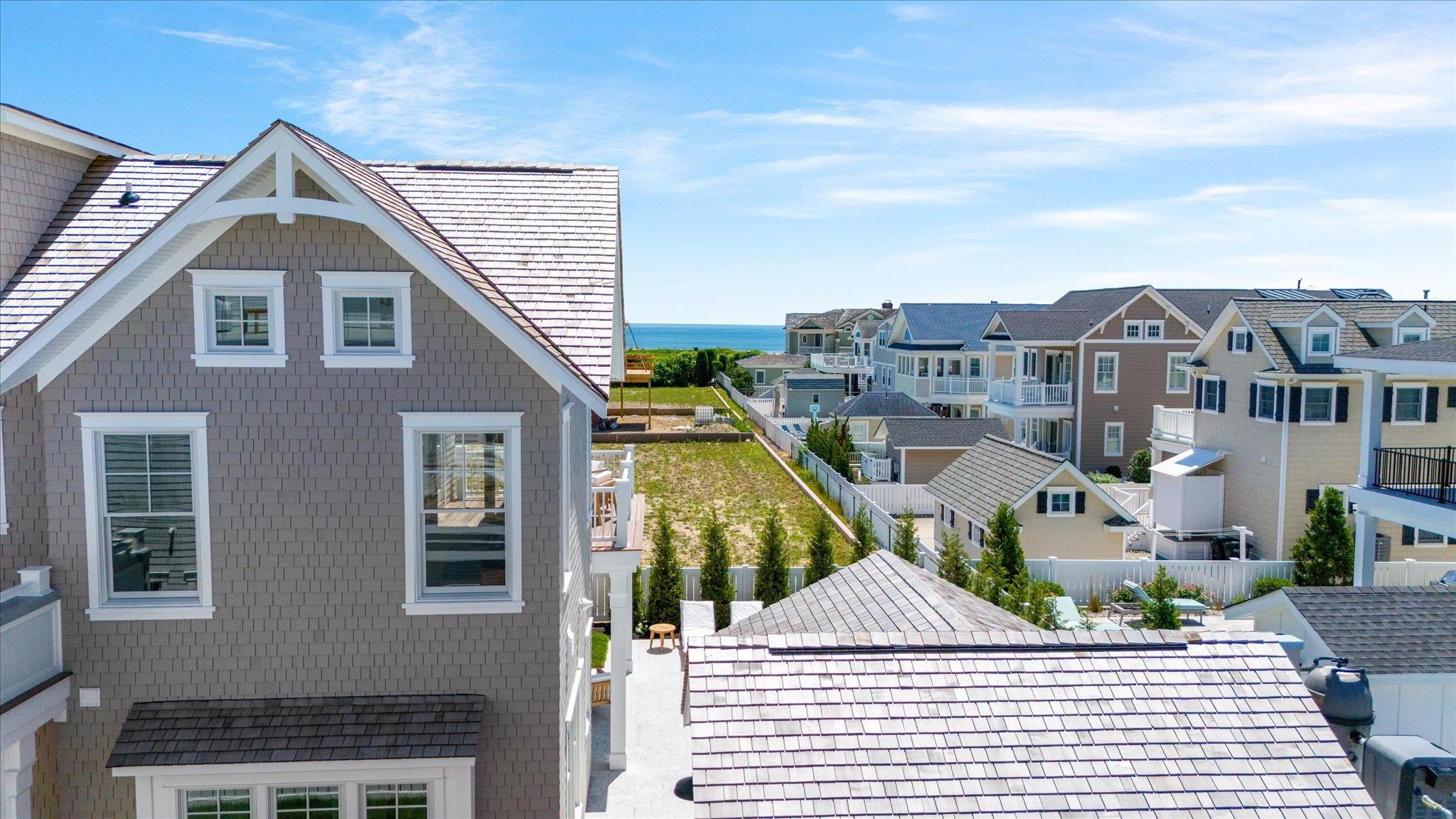 155 112th Stone Harbor, NJ 08247 - Photo 46 of 49 a view of buildings with wooden stairs