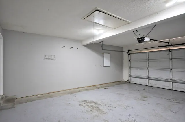 a view of a house with wooden deck