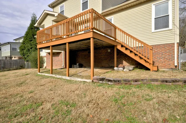 a view of deck with a yard